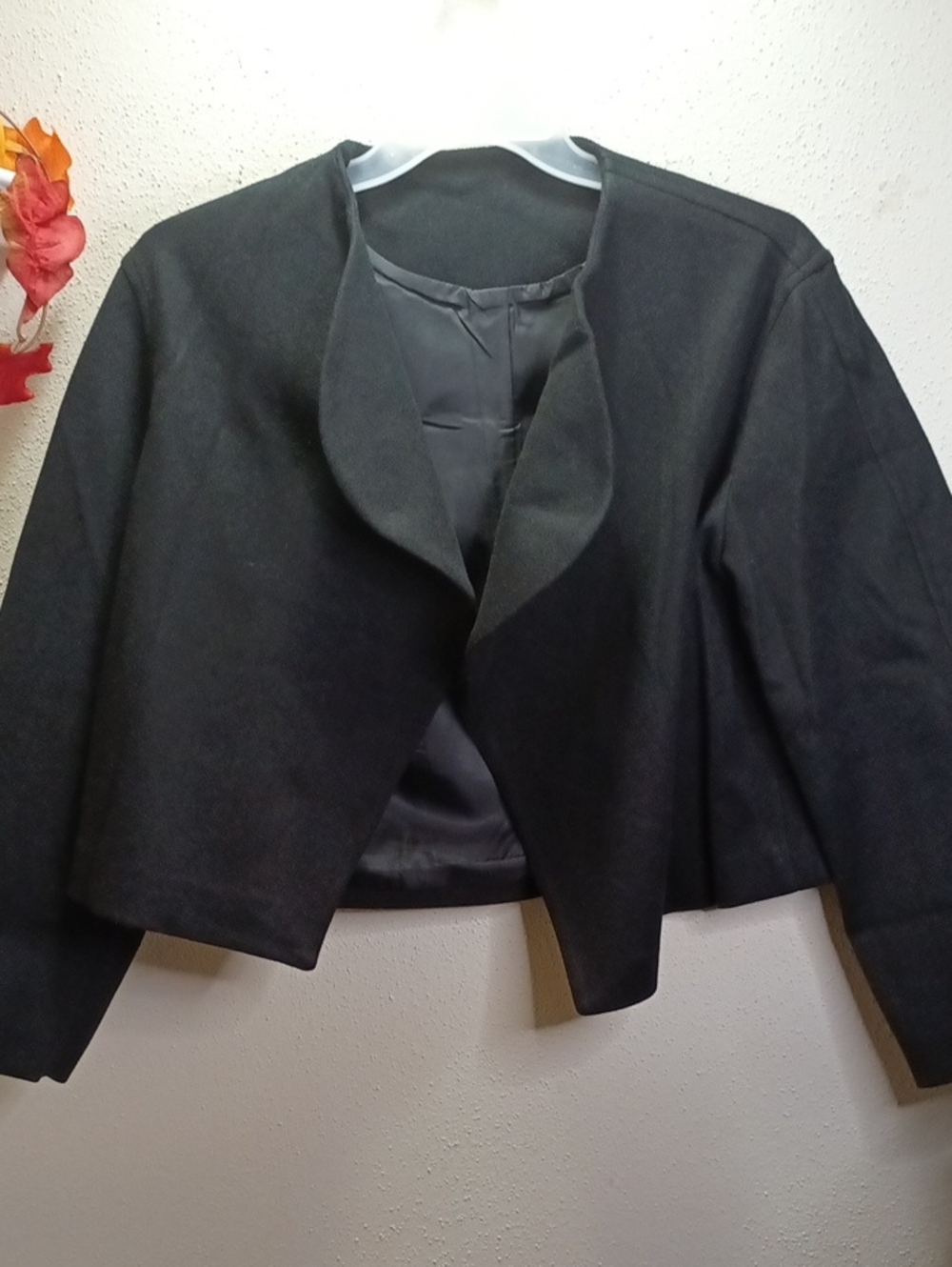 Black cropped blazer no pockets. Unbranded. Size Med